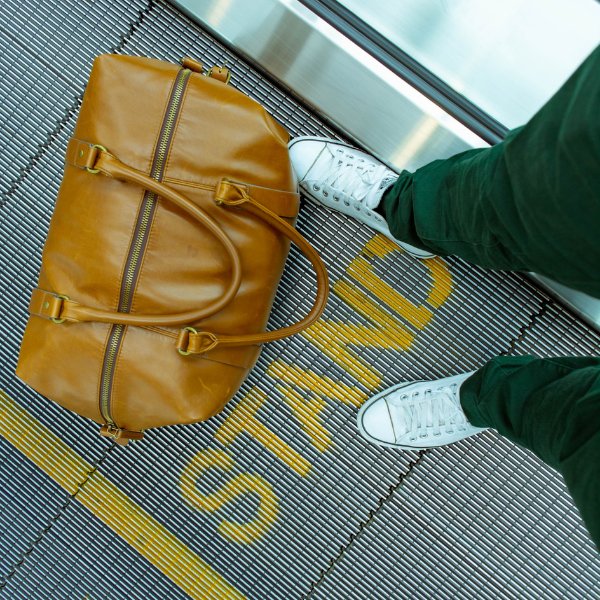 a duffel bag on airport terminal walkway