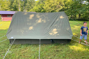 green tent with boy