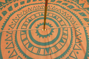 center pole on a rug in bell tent