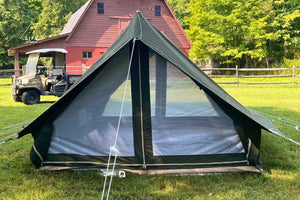 green tent with barn