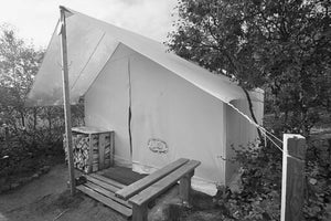 black and white image of wall tent on deck